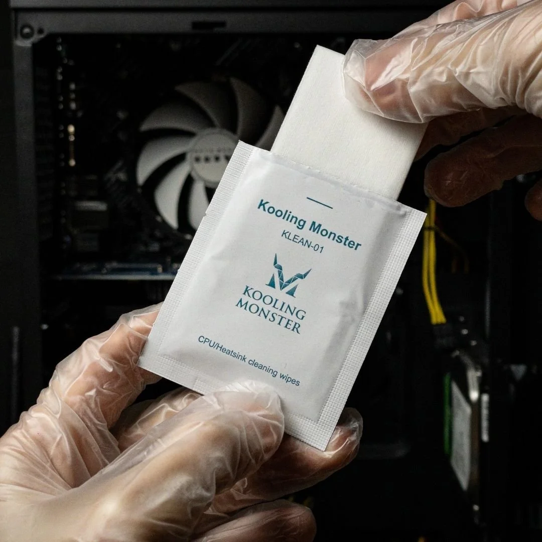 KLEAN-01 in use - holding cleaning wipe in PC case